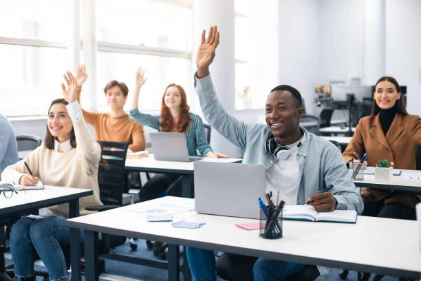 Students engaged in a small college class